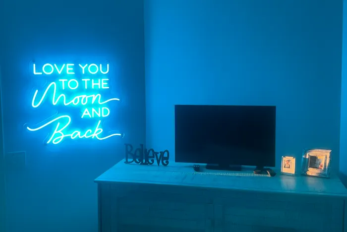 WebcamCoversNow.com - I Love You To The Moon And Back Neon Sign