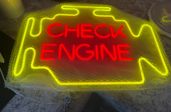 WebcamCoversNow.com - Check Engine Neon Sign