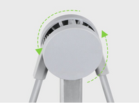 A white, round showerhead with green arrows indicating an adjustable swivel feature; set against a plain, light background.