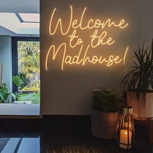 Welcome To The Madhouse Neon Sign - Webcam Covers Now