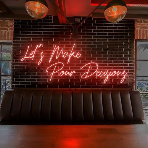 Eye-Catching "Let's Make Pour Decisions" Neon Sign - Webcam Covers Now