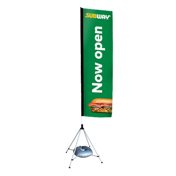 A tall green banner with the logo 'SUBWAY' and the words 'Now open' above a picture of a sandwich, mounted on a tripod stand.